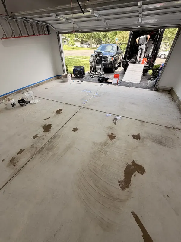 Bare garage floor before coating