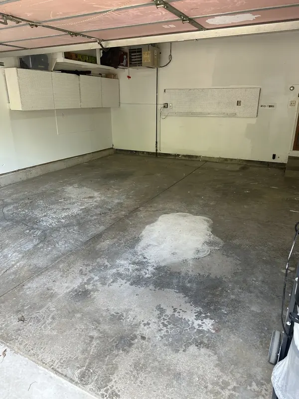 Stained bare concrete before coating