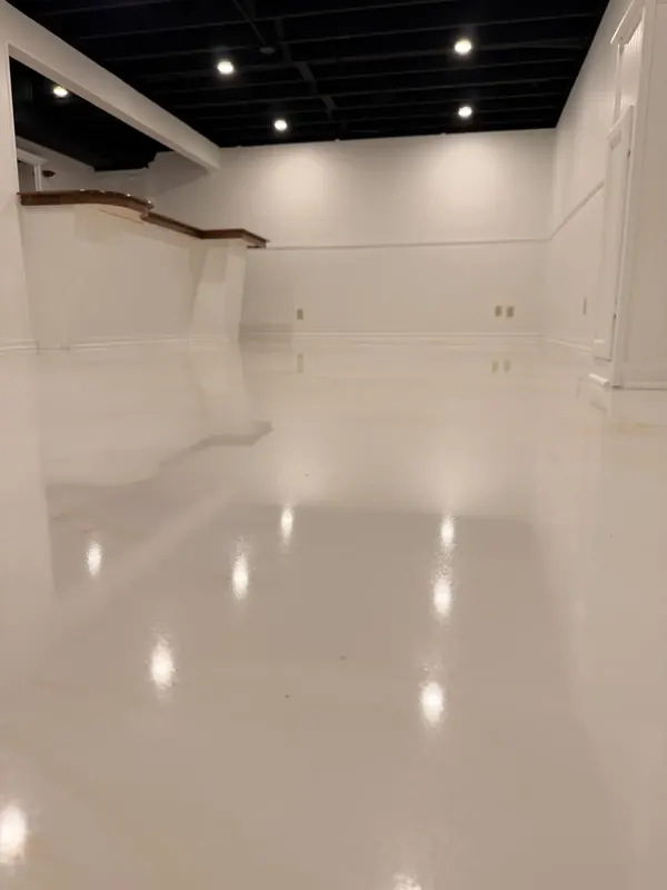 Glossy white coated basement floor