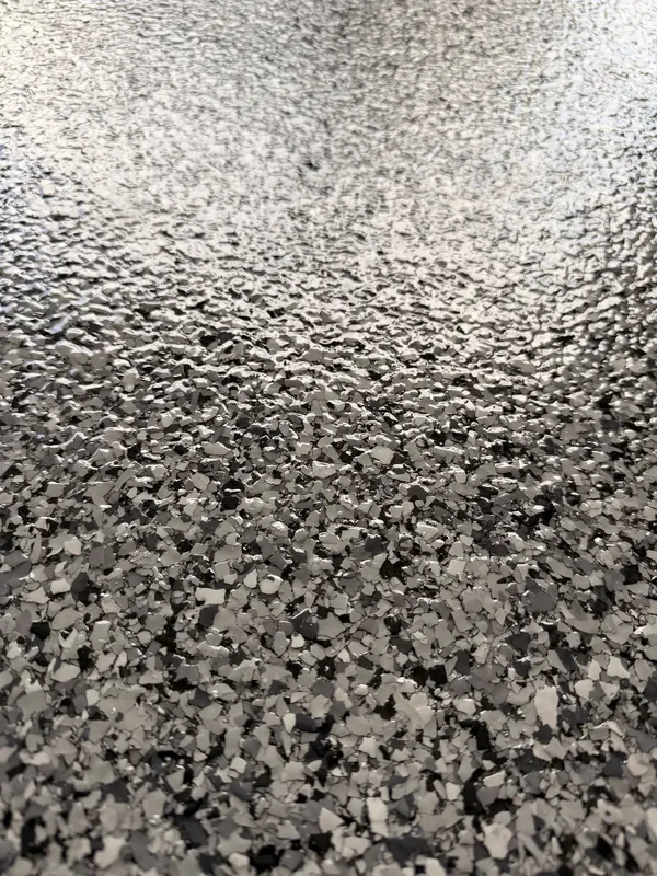 Close up of gray flake coating