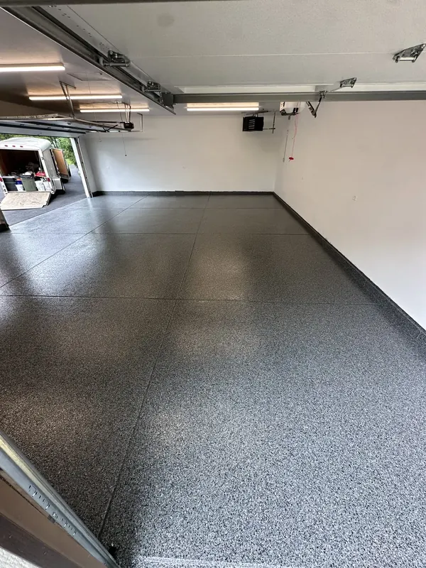 Wide view of a gray flake garage floor