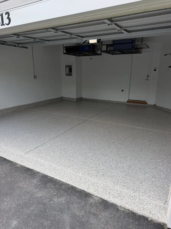 Speckled coating on a single bay garage floor