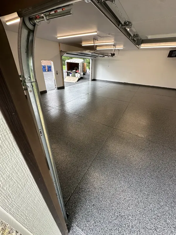 Speckled finish across a three bay garage floor