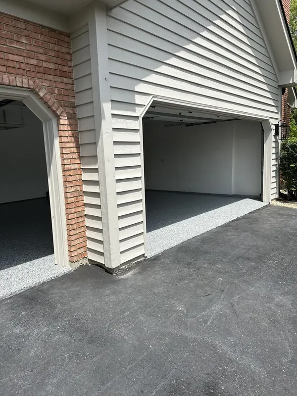 Flake floor at the entrance of a two bay garage