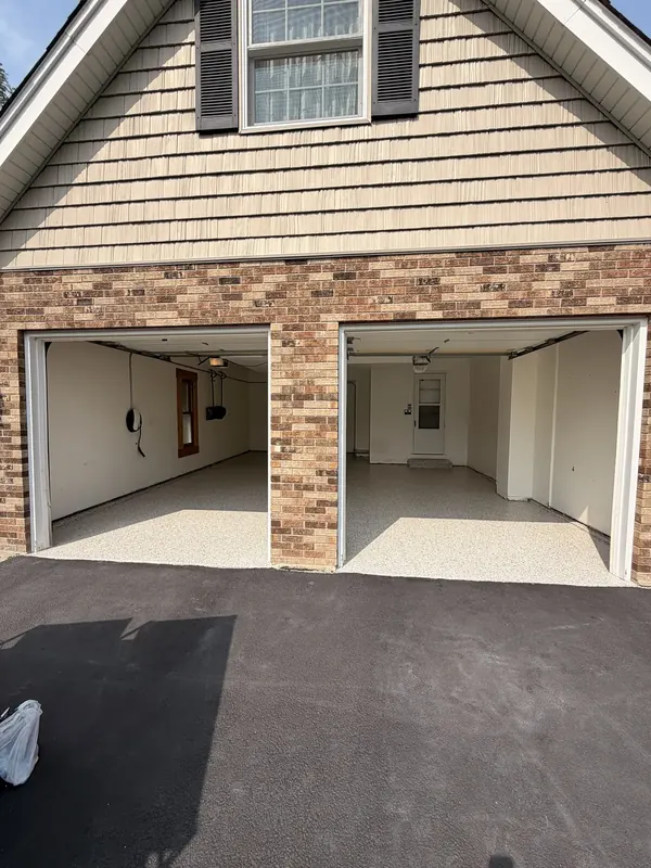 Finished floors in two open garage bays