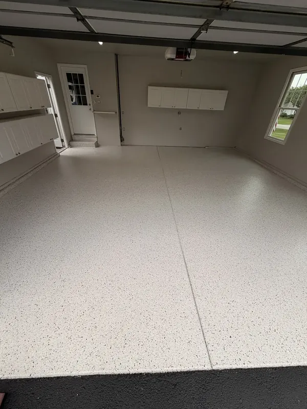 White flake floor in a two car garage