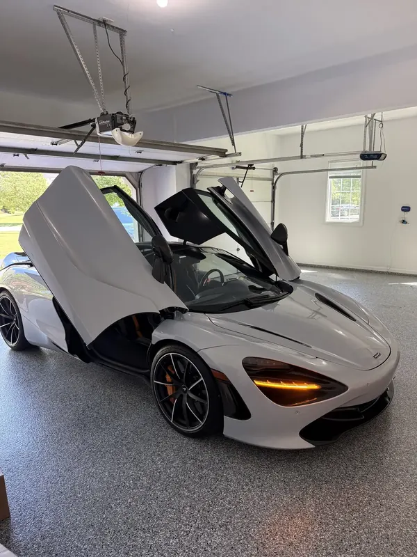 White sports car on a flake floor