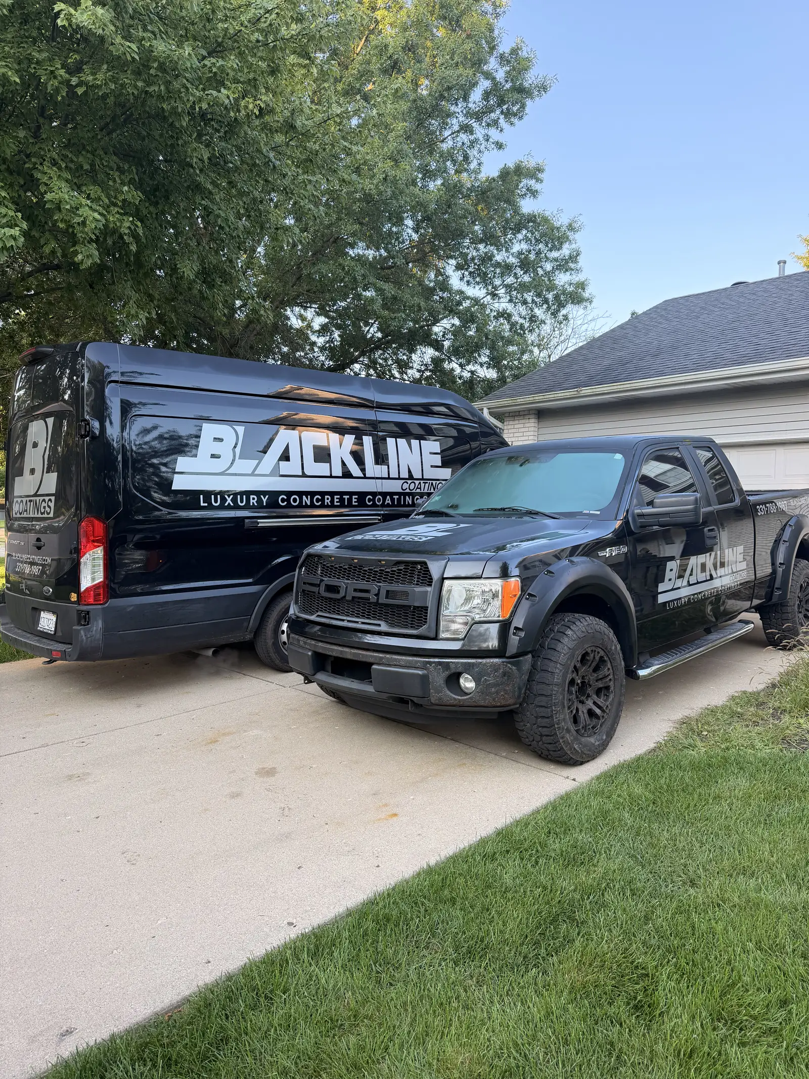 The Blackline Coatings truck parked on a suburban driveway